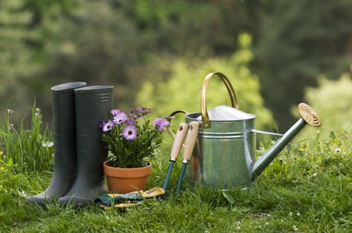 Professional gardeners following health and safety procedures outdoors